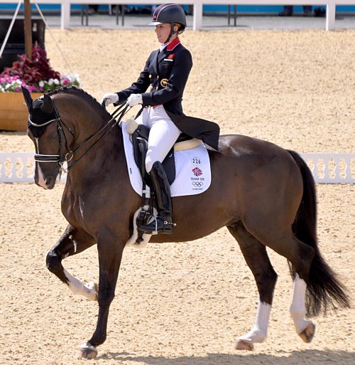 Charlotte Dujardin and Valegro at the London 2012 Olympic Dressage An upper level dressage horse and rider perform a series of movements upon which they will be judged.